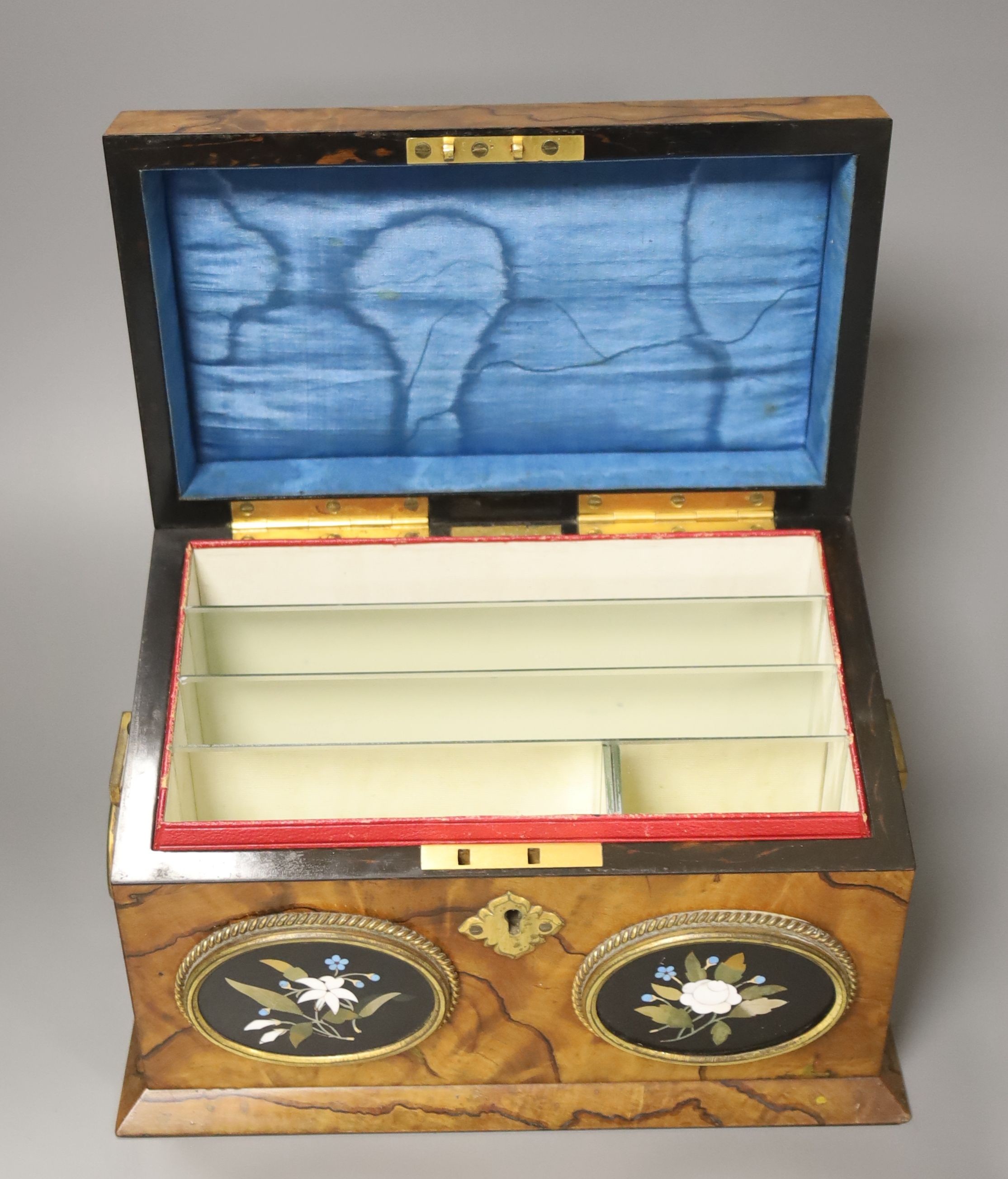 A Victorian olive wood and Ashford pietra dura mounted stationary box, retailed by Payne & Son, Lowndes St and original figuring, 24cm